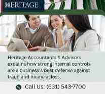 Accountants advising clients during a business consultation at Heritage Accountants & Advisors