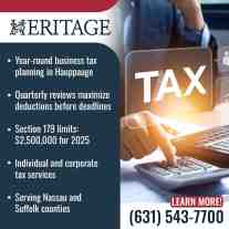 Accountant using calculator during business tax planning session.