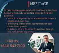 Heritage Accountants & Advisors graphic promoting strategic financial guidance with contact information and a professional advisor at a desk.