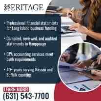 Accountant preparing financial statements with calculator and documents.