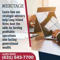 Business advisors reviewing financial data on laptops during a strategy session