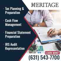 Accountant reviewing financial reports and charts with client consultation documents